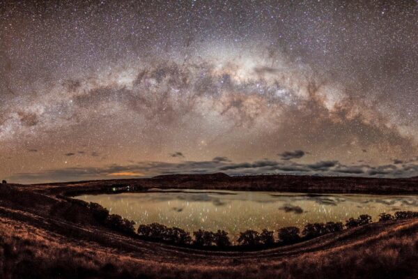 Milky Way galaxy soaring in Lake Tekapo