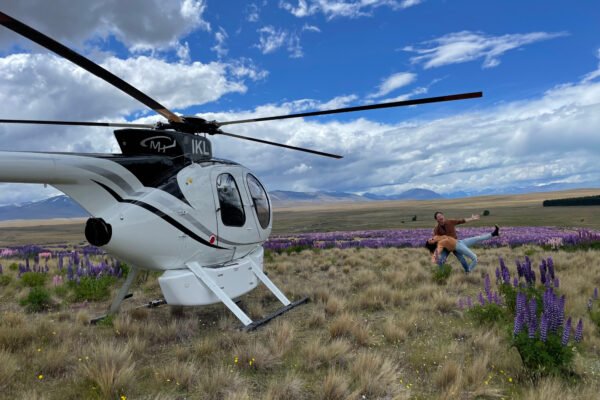 People enjoying helicopter tours in the Mackenzie region near Lake Tekapo